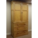 Pine cupboard on chest, two panelled doors above three drawers, W116cm, H214cm,