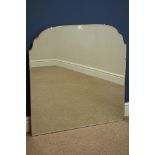 Early 20th century shaped bevel edged mirror,