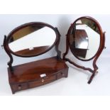 Early 19th Century bow front mahogany toilet mirror with turned bone handles,