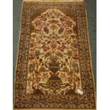 Persian cream ground prayer rug, tree of life design with urn,