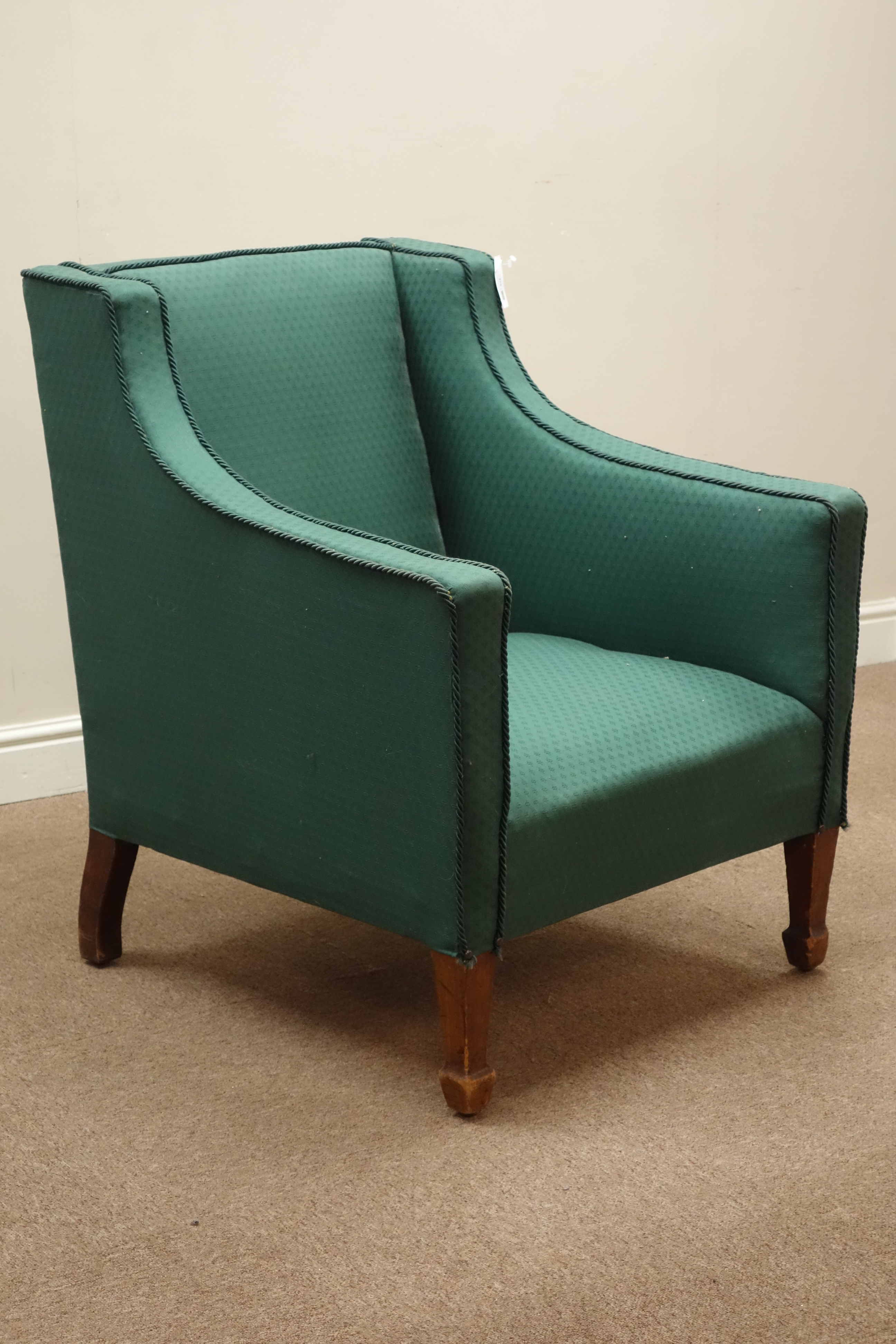 20th century Regency shaped armchair upholstered in green,