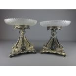Pair of Victorian silver plated centrepiece bases each mounted with three swans raised on three