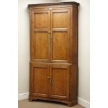 19th century oak floor standing corner cupboard, dentil cornice above four crossbanded doors, W94cm,