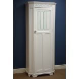 Early 20th century white painted oak hall wardrobe, with linen fold and carved lunettes,
