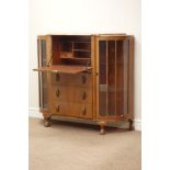 Mid 20th century walnut secretaire bookcase, fall front above three drawers,