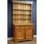 Waxed pine kitchen dresser, two drawers, two cupboards, raised three heights plate rack, W113cm,