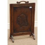 Late 20th century mahogany panelled fire screen, carved with knights head, dated 1982 to back,