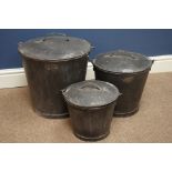 Three graduating metal buckets with beaten shaped lids Condition Report <a