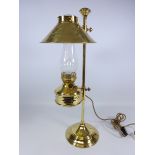 Brass electric table lamp in the style of a oil lamp,