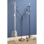 Two wrought metal standard lamps and similar candle stand Condition Report <a
