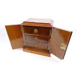 Victorian figured and crossbanded walnut chest enclosed by two doors,