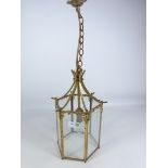 Octagonal brass and glass hall lantern,