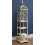 Metal dome top lantern on three tier stand,