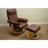 Adjustable reclining swivel armchair upholstered in brown leather and matching footstool