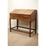 Late Georgian mahogany clarks desk, sloped top with sectional hinged compartment, drawer to frieze,