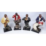 Set of four large Sheudhill Jazz players on polished stone bases,