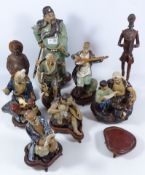 Seven Chinese figures and two carved wooden figures (9) Condition Report <a