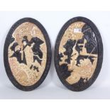 Pair of Bretby pottery oval plaques, relief decorated with Oriental Scenes,