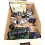 Collection of fishing equipment including rods, reels,