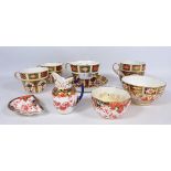 Royal Crown Derby Imari pattern large teacup and saucer, three other teacups,