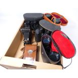 Two pairs of Greenkat 12x50 & 10x50 binoculars, Voigtlander Bessa folding camera,