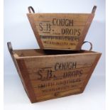 Set of two rustic 'Cough Drops' wooden baskets,