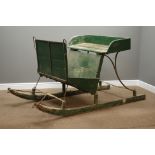 Early 20th century wrought metal and green painted sleigh, L213cm, W104cm,