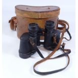 Pair of Barr & Stroud CF 24 8 X 30 binoculars in tan leather case Condition Report