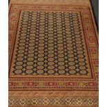Persian Bokhara design blue ground rug/wall hanging,