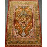 Persian silk prayer rug, decorated with urn with flowers, floral motifs and birds,