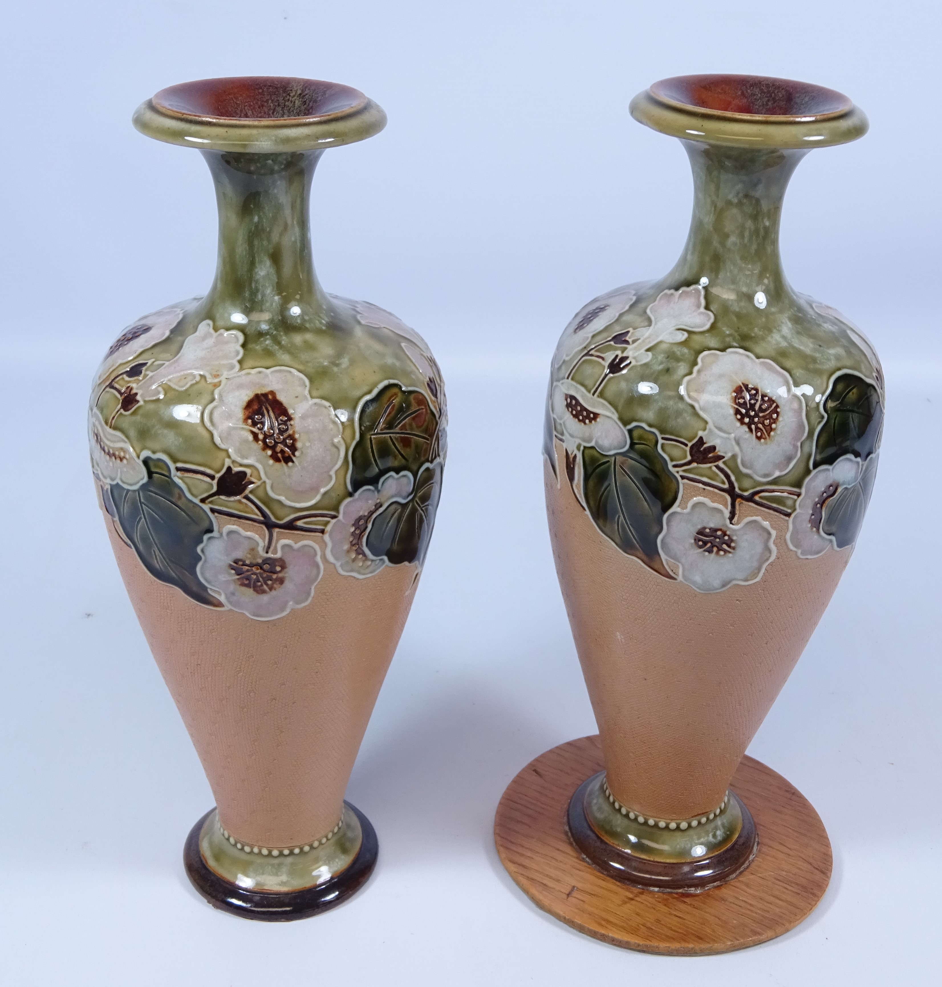 Pair of early 20th Century Royal Doulton stoneware vases, H26.