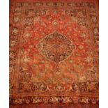 Large Persian red ground rug carpet, large central rosette medallion,