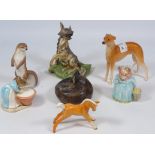 Poole pottery fox, Beswick foal, Capodimonte dog, two Beswick Beatrix Potter figures,