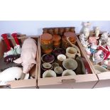 Pig sculptures, teapots, Hornsea storage jars and spice rack,