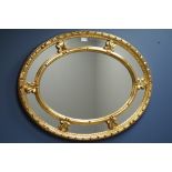 Oval gilt framed mirror, 93cm x 74cm Condition Report <a href='//www.