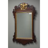 Early 20th century Chippendale style mahogany fret work mirror, with gilt Griffin motif,