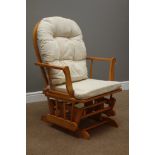 Beech framed hoop and stick back rocking armchair with upholstered loose cushions