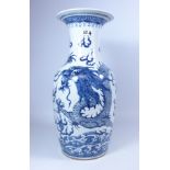 19th/ early 20th Century Chinese blue and white vase decorated with Dragons above waves, H44.