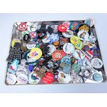 Collection of vintage badges including Military, Norton, Gollies,