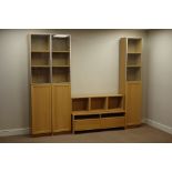 'Billy' light oak finish five piece wall unit, three tall narrow cabinets,