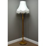 Stained beech standard lamp with shade,