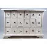 Small white painted eighteen drawer chest, W65cm, H44cm,