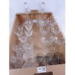 Pair of Edwardian cut crystal decanters, set of six hock glasses with cut floral decoration,