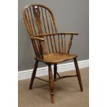 Early 19th century ash and elm double bow Windsor armchair, stick and pierced splat back,