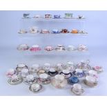 Collection of miniature cups and saucers including; Coalport, Spode, Royal Crown Derby,