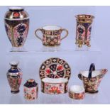 Early 20th Century Royal Crown Derby miniature ceramics; vase no.1128, footed vase no.