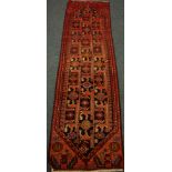Persian Baluchi red ground runner rug,