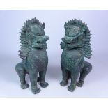 Pair of Burmese type patinated cast metal models of Temple Lions,