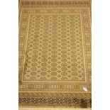 Persian Bokhara design green ground rug/wall hanging,