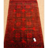 Old Baluchi red ground rug, 136cm x 85cm Condition Report <a href='//www.